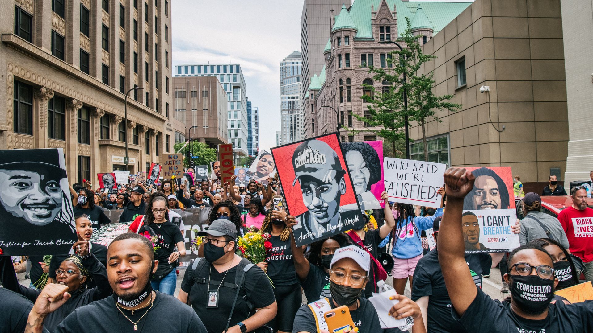 People march during an inaugural remembrance demonstration for George Floyd on May 23, 2021 in Minneapolis, Minnesota.