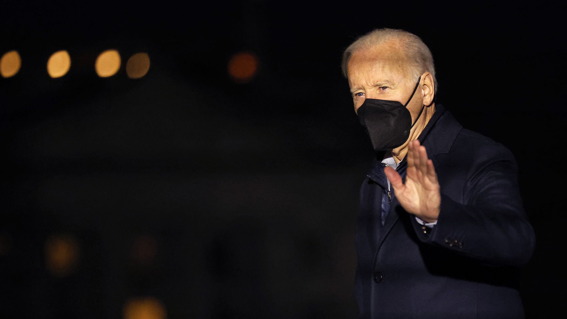 U.S. President Joe Biden waves to journalists as he returns to the White House on January 17, 2022 in Washington, DC. 