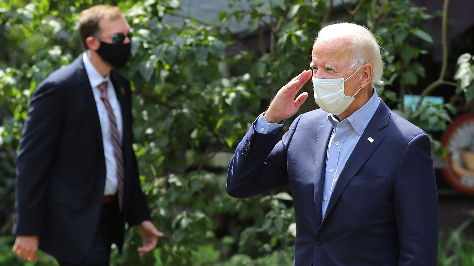 Democratic presidential nominee Joe Biden salutes as he arrives for a meeting with veterans and union leaders in the backyard of a supporter on Labor Day September 07, 2020 in Lancaster, Pennsylvania