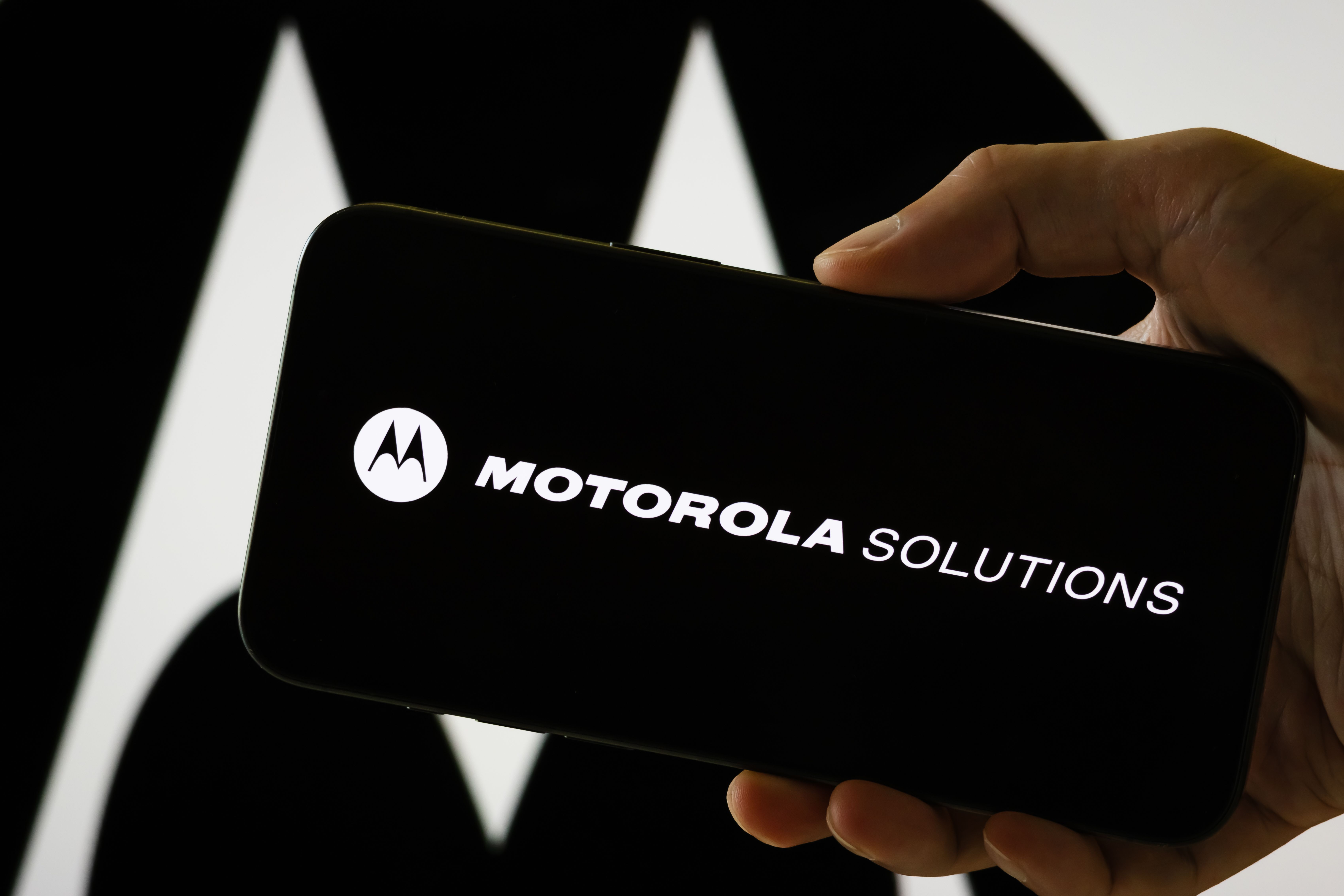 Photo of a phone with the words "Motorola Solutions" on it 