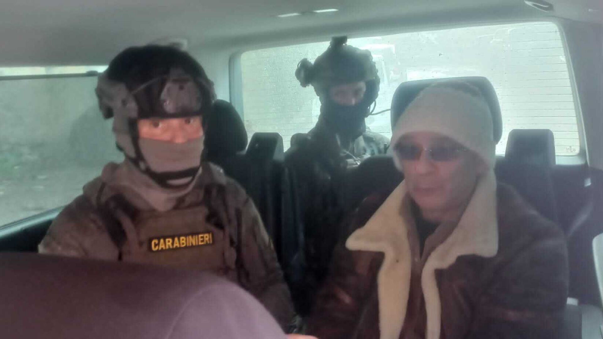 Matteo Messina Denaro being transported by police after being arrested in Sicily, on Jan. 16.