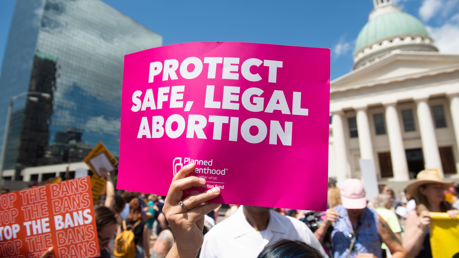 Picture of a Planned Parenthood sign that says "protect safe, legal abortion"