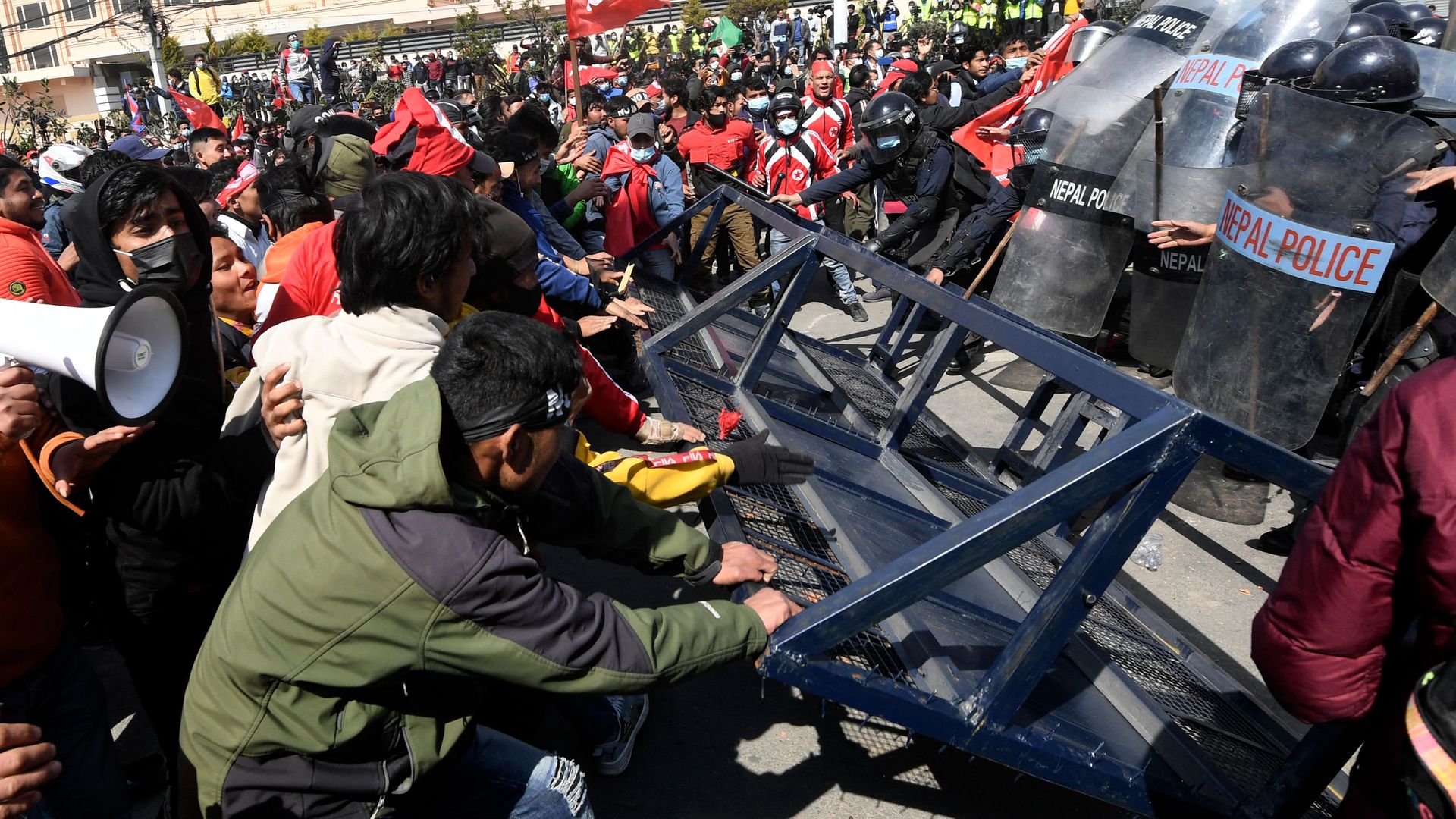 Demonstrators clash with police during a protest against the proposed grant agreement from America under the Millennium Challenge Corporation (MCC), in Kathmandu on February 20