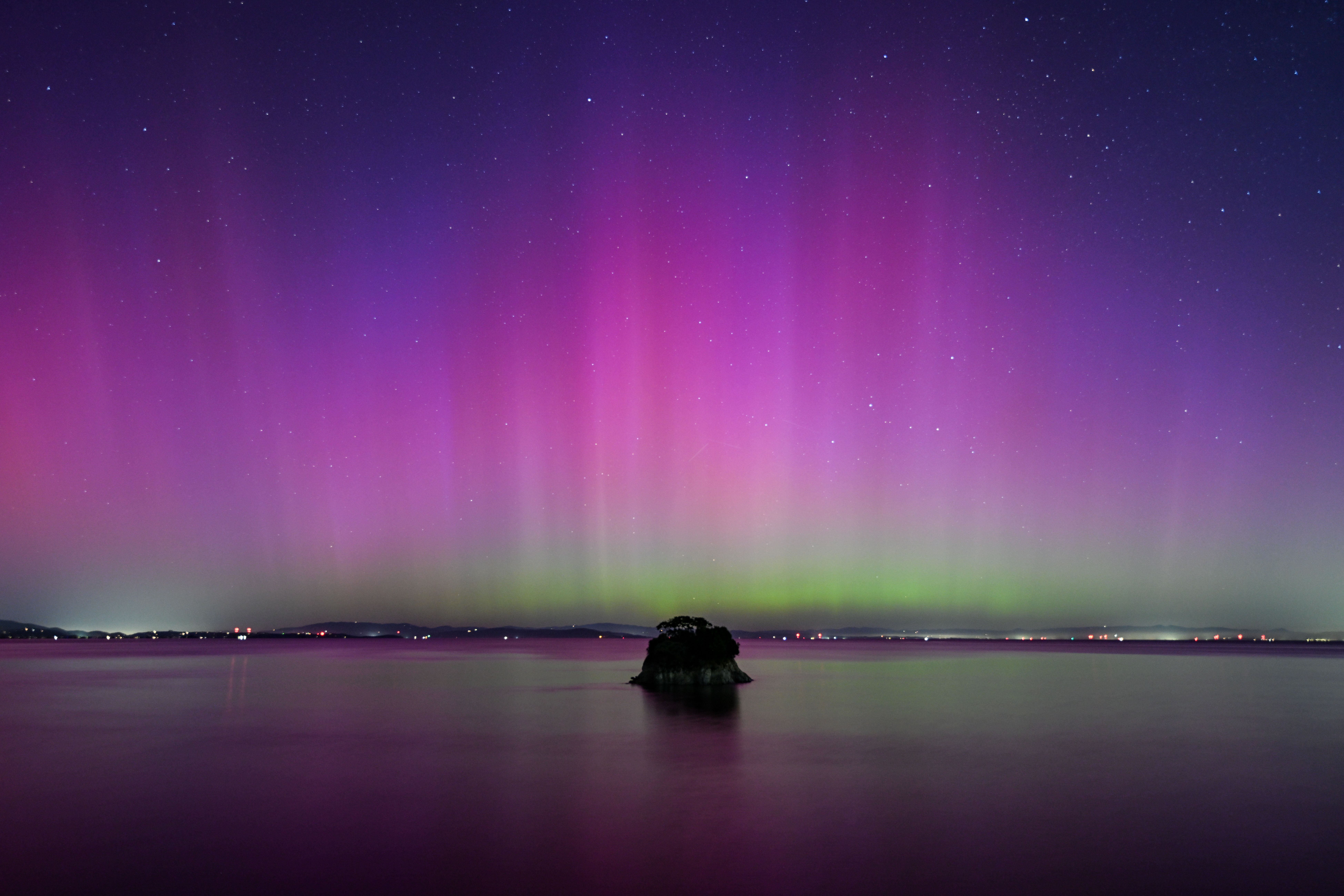   Northern Lights (Aurora Borealis) illuminate the sky of San Francisco North Bay, California.