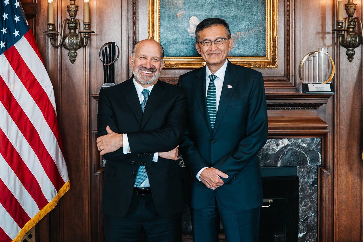 Commerce Secretary Howard and Intel CEO  Lip-Bu Tan at the Commerce Department yesterday