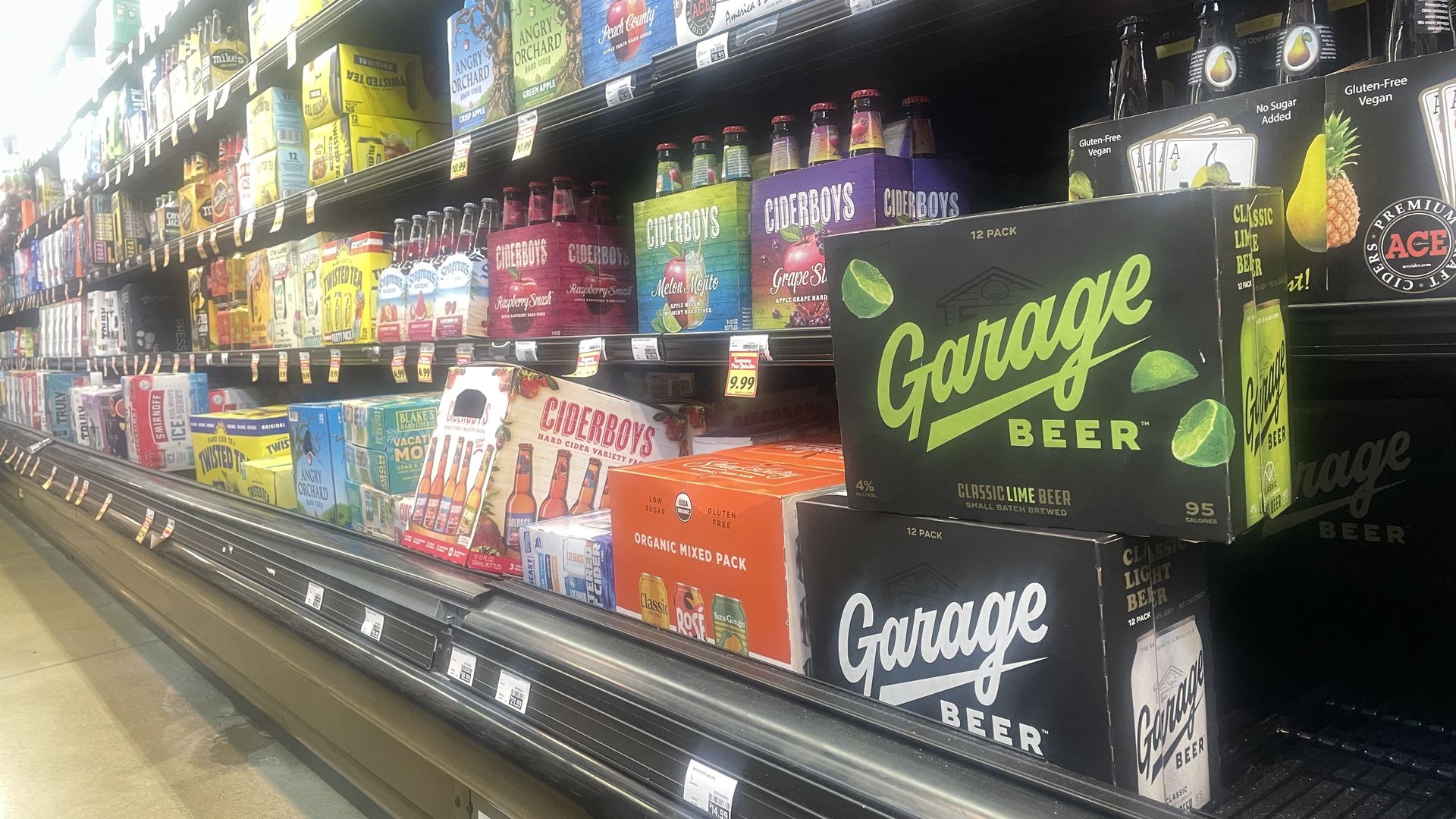 Garage Beer 12 packs in a grocery store aisle