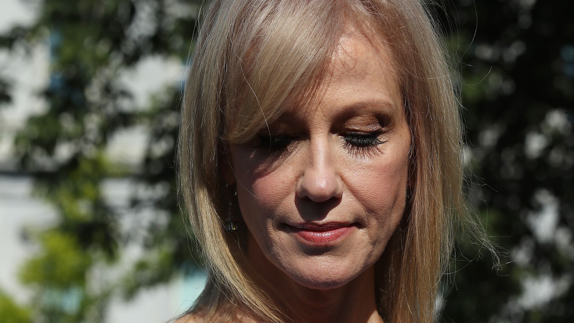 Kellyanne Conway looking down.