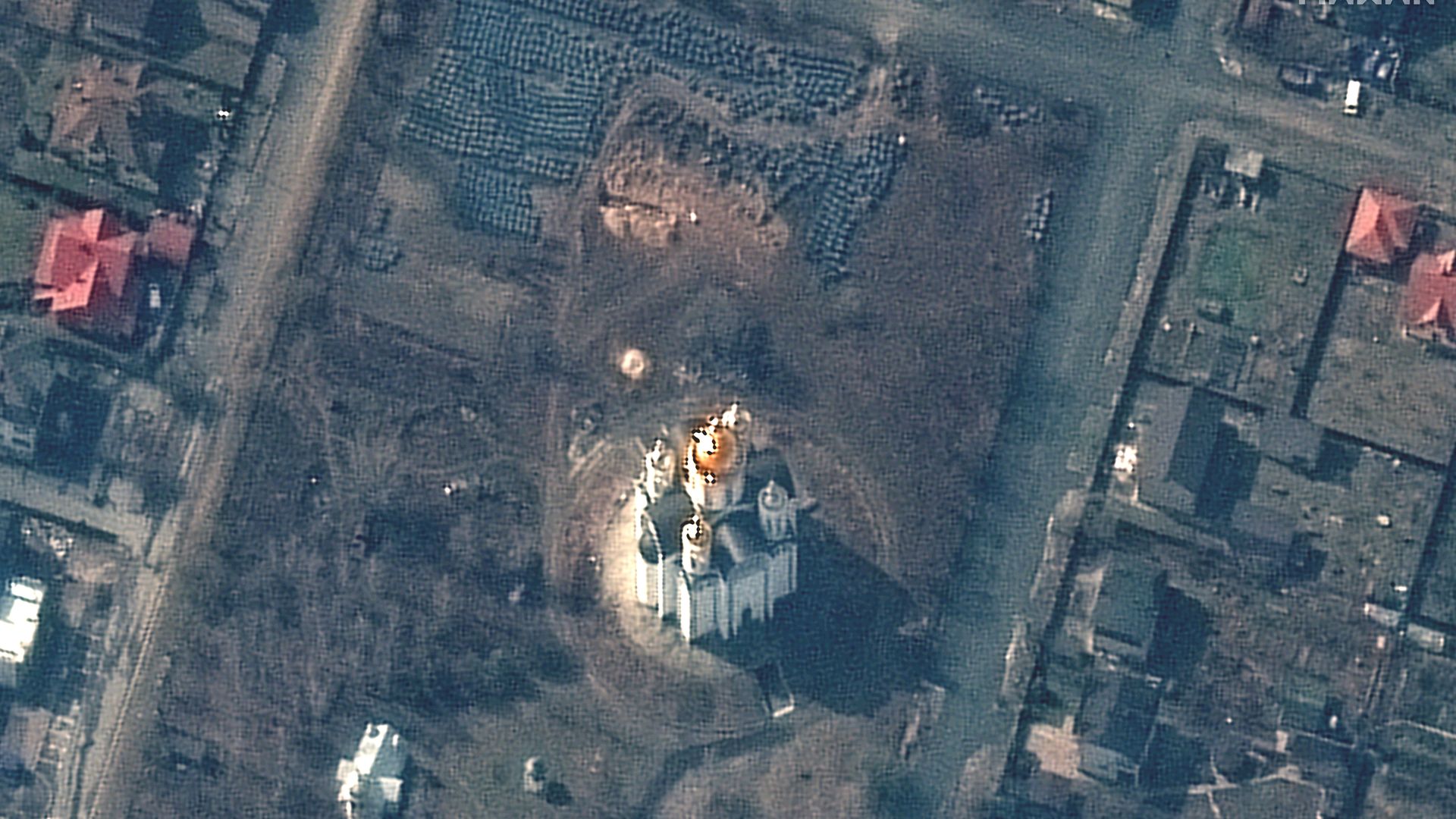 A satellite image of a site identified as a mass grave in the town of Bucha, Ukraine, northwest of the capital of Kyiv.