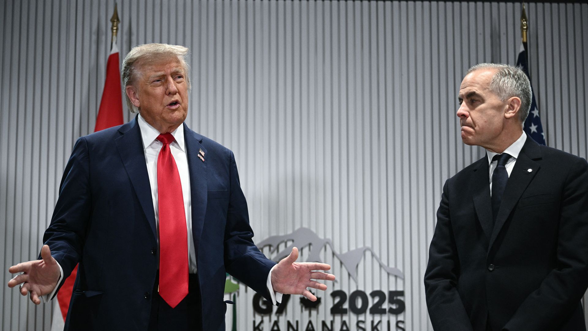 President Donald Trump speaks to the press as Canadian Prime Minister Mark Carney looks on as they meet during the Group of Seven (G7) Summit at the Pomeroy Kananaskis Mountain Lodge in Kananaskis, Alberta, Canada on June 16, 2025. 