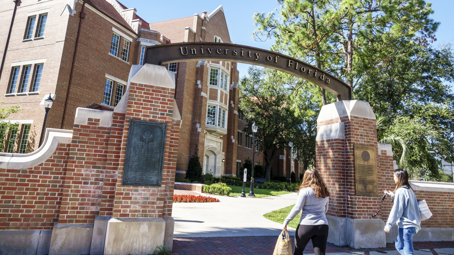 Gainesville, University of Florida, campus entrance with students.
