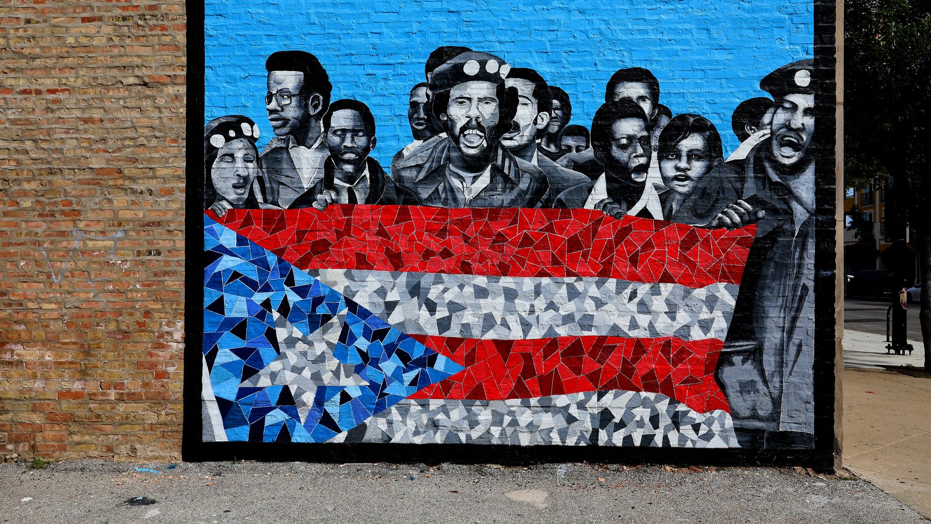 Luis Raúl Muñoz' mural of the Young Lords Party, a Puerto Rican political movement founded in Chicago.