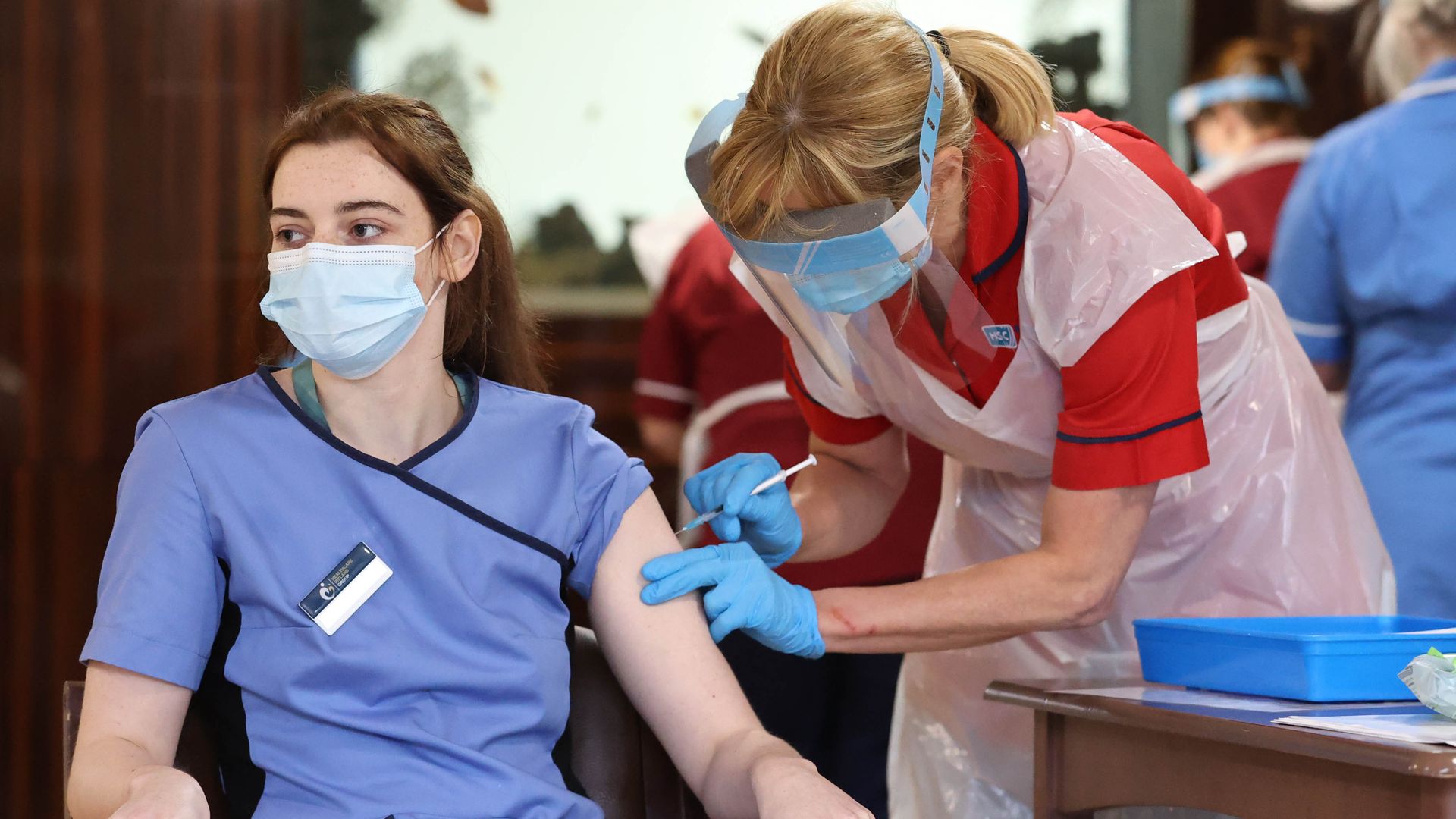 A care home staff receiving a dose of the Pfizer/BioNtech coronavirus vaccine in Belfast on Dec. 9.