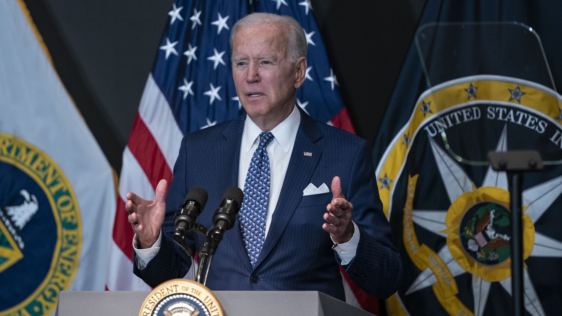 President Joe Biden delivers remarks while visiting the Office of the Director Of National Intelligence (DNI) headquarters in McLean, Virginia on Tuesday