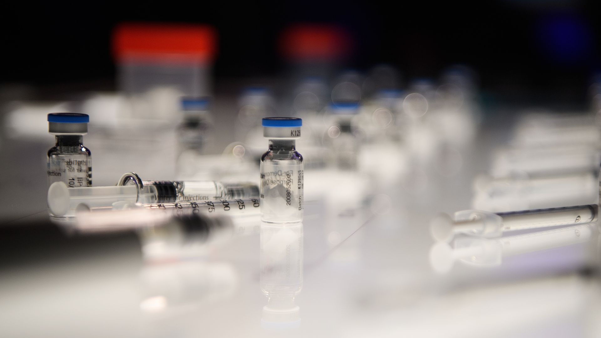 Vials and syringes in a lab