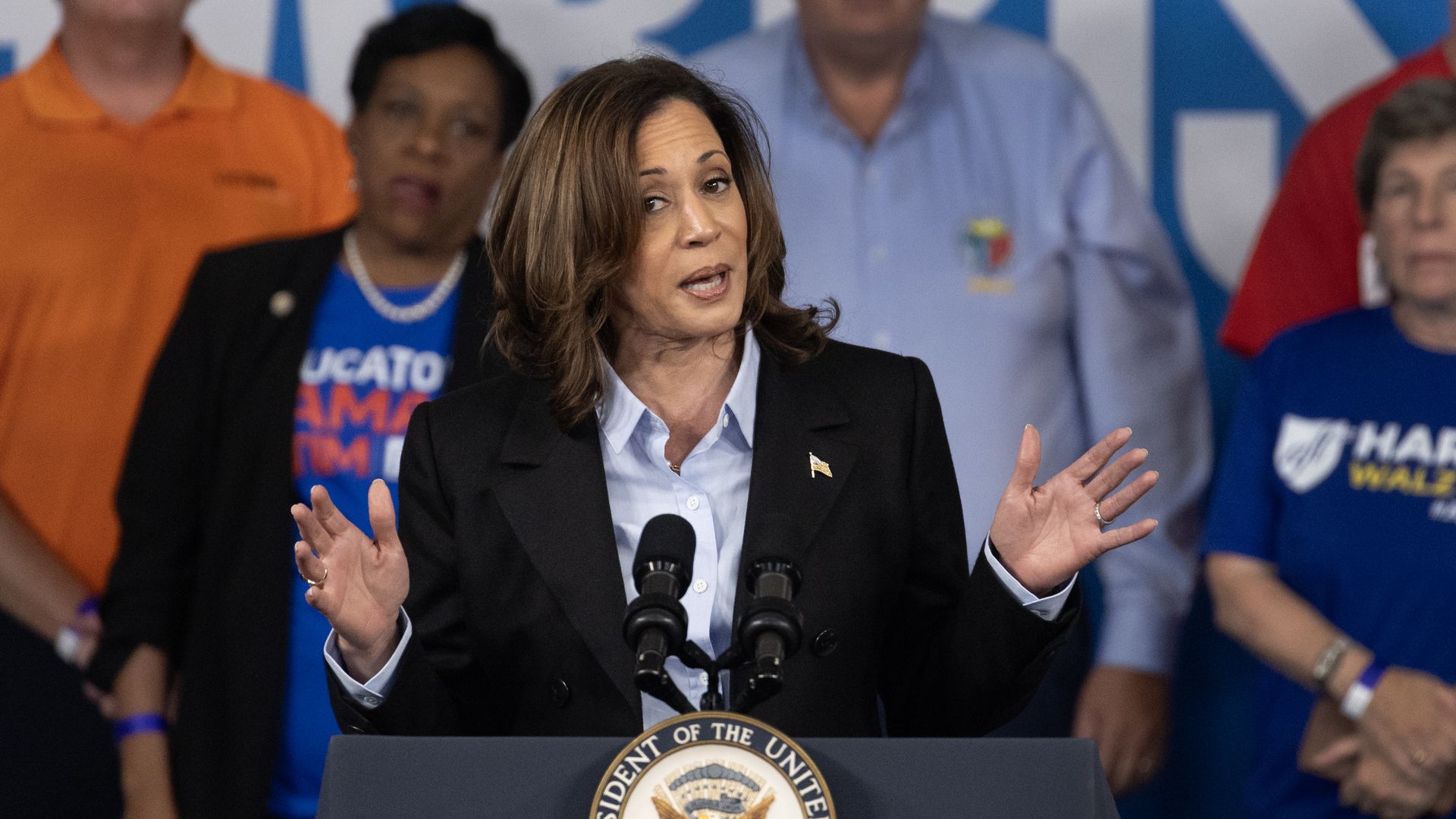 Kamala Harris speaks at a podium
