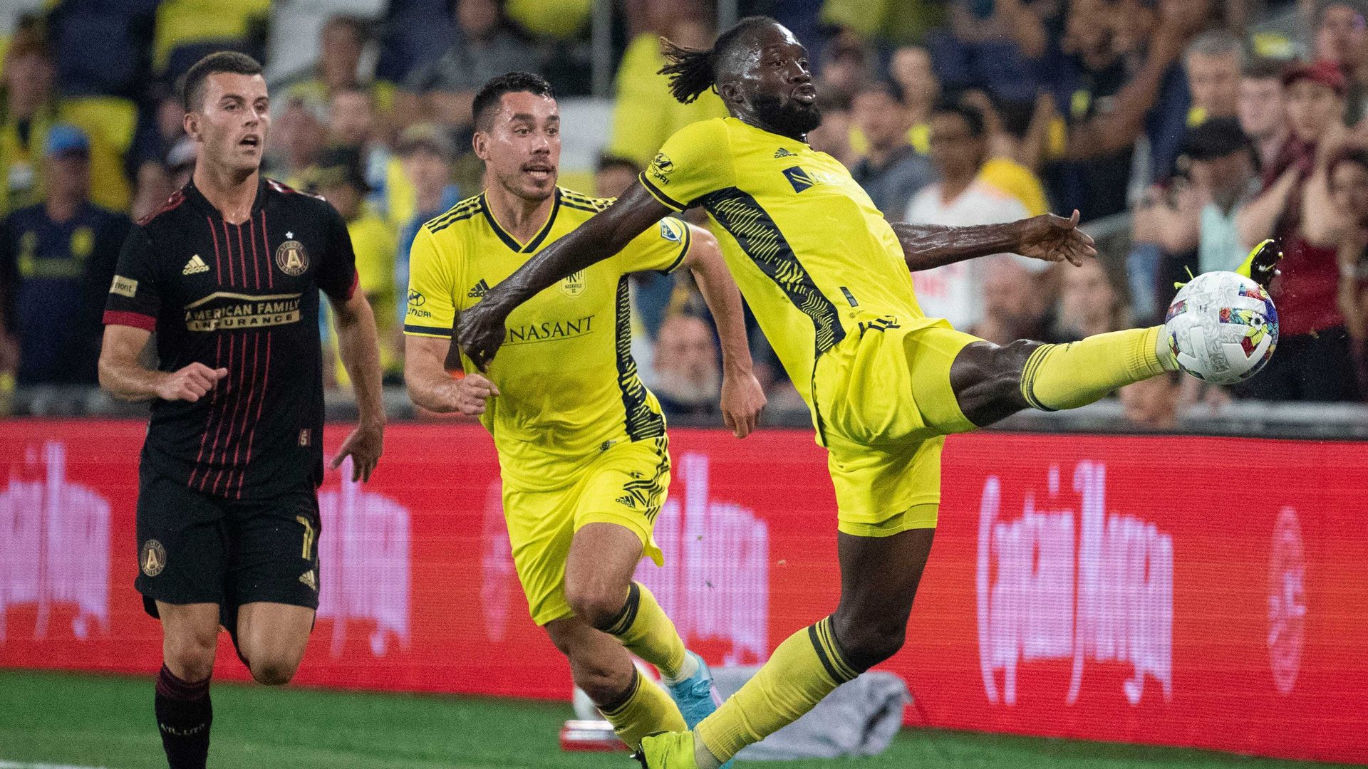 Soccer players on the field during a game.