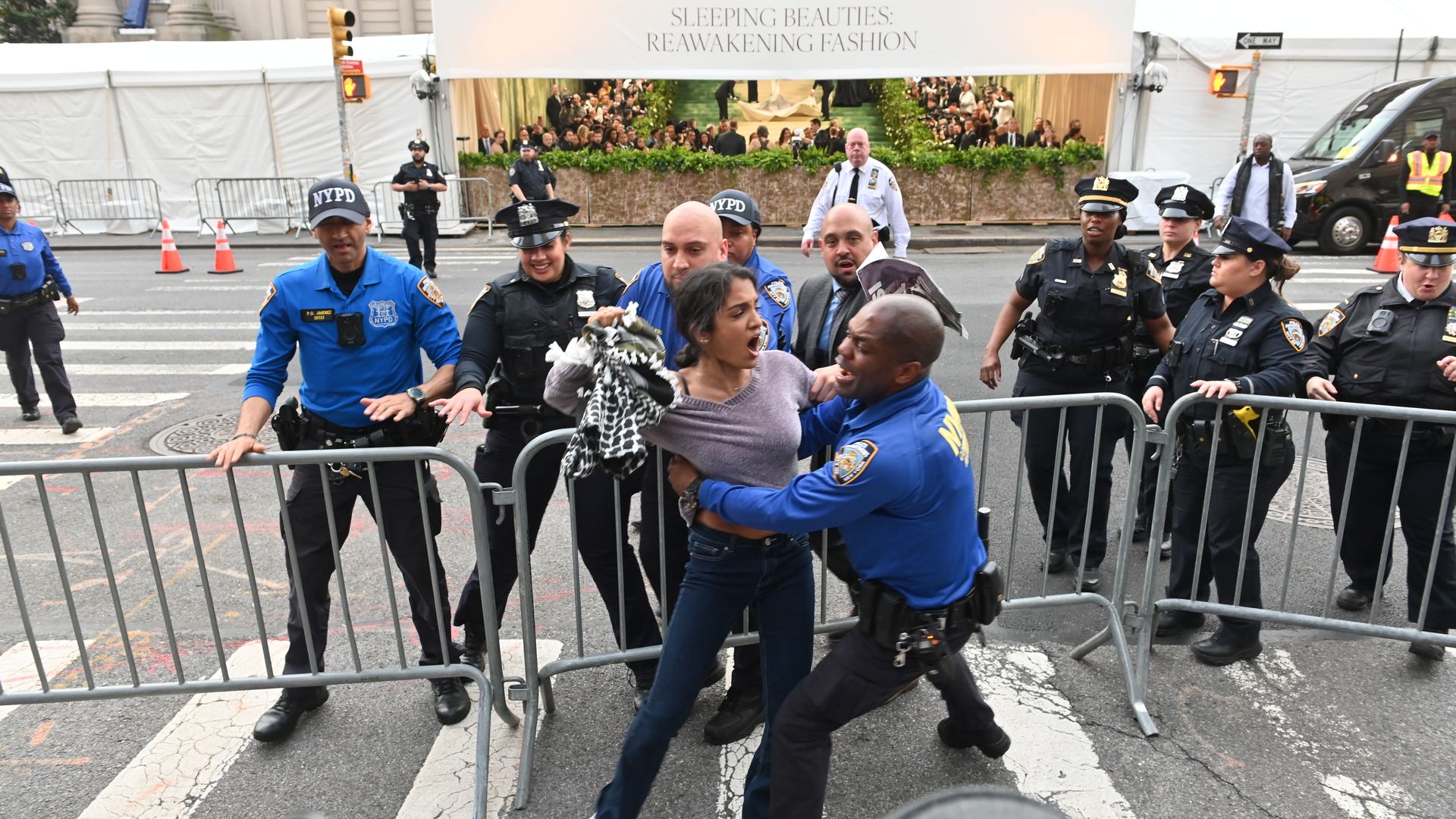 NYPD officers arrest pro-Palestinian protester outside the 2024 Met Gala Celebrating "Sleeping Beauties: Reawakening Fashion" on May 6, 2024 in New York City. 