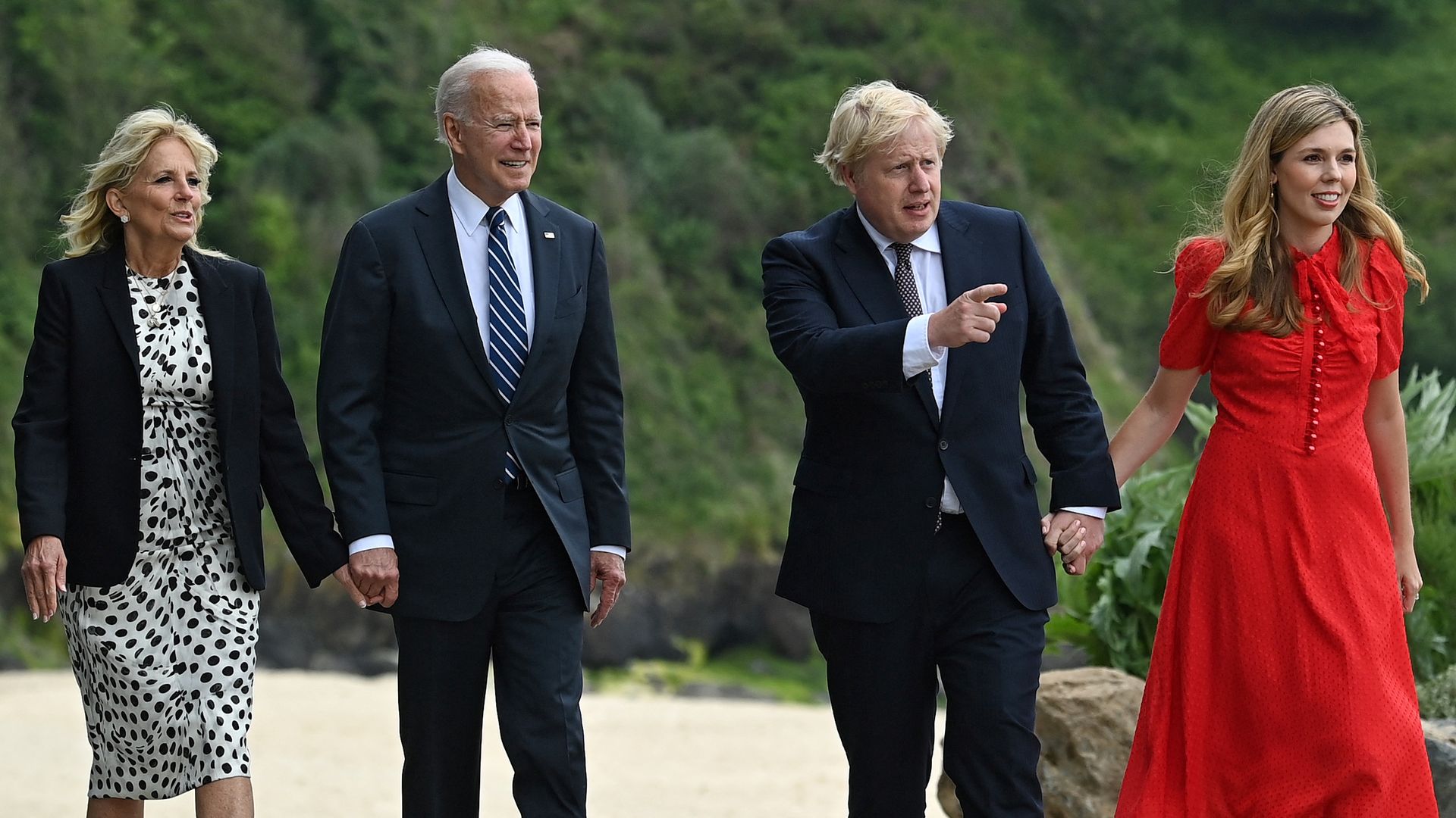 The Bidens and the Johnsons walking to meeting before G-7 summit.
