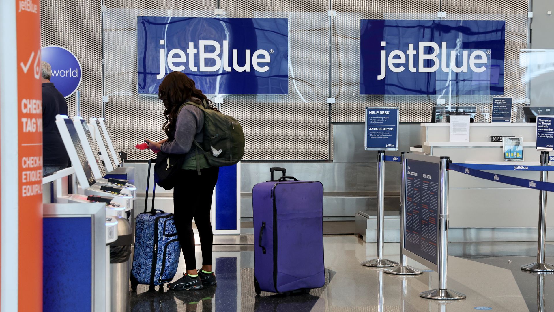 A passenger checks in for a JetBlue flight at O'Hare International Airport on April 06, 2022 in Chicago, Illinois.