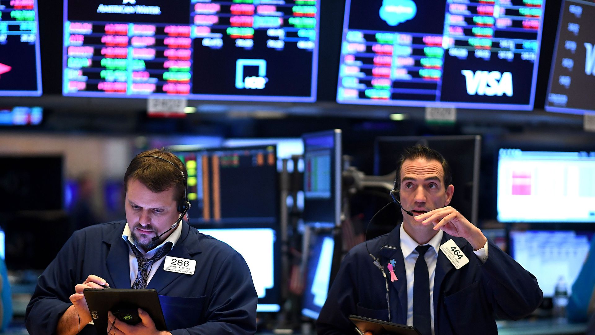 Traders work during the opening bell at the New York Stock Exchange (