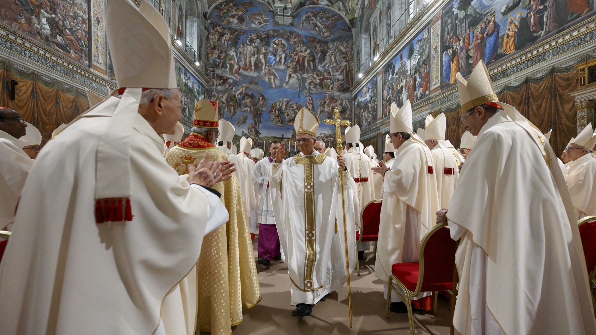 Cardinals in sistine big hats