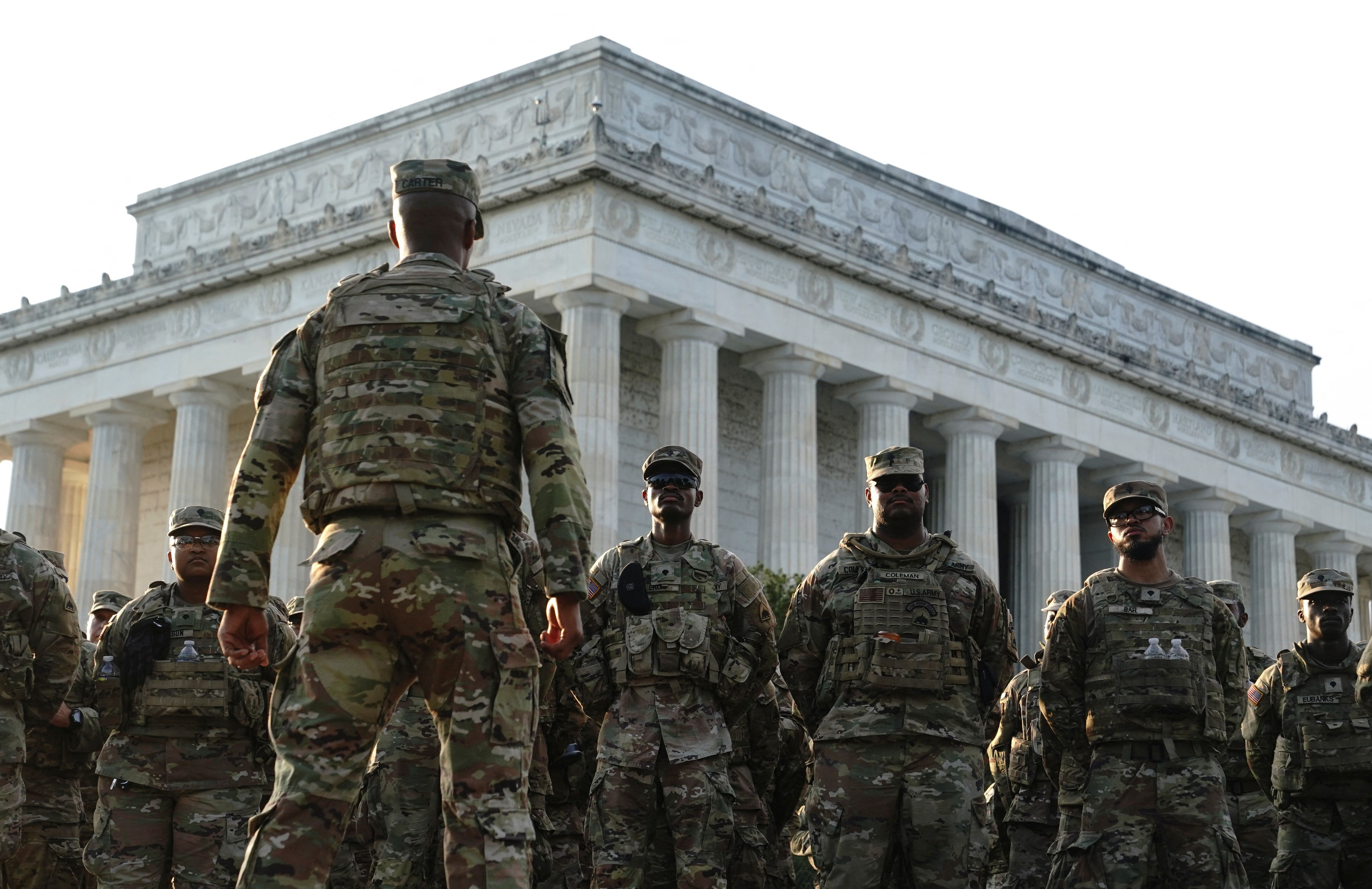 National Guardsmen stand outside the Lincoln Monument on the National Mall on Saturday.
