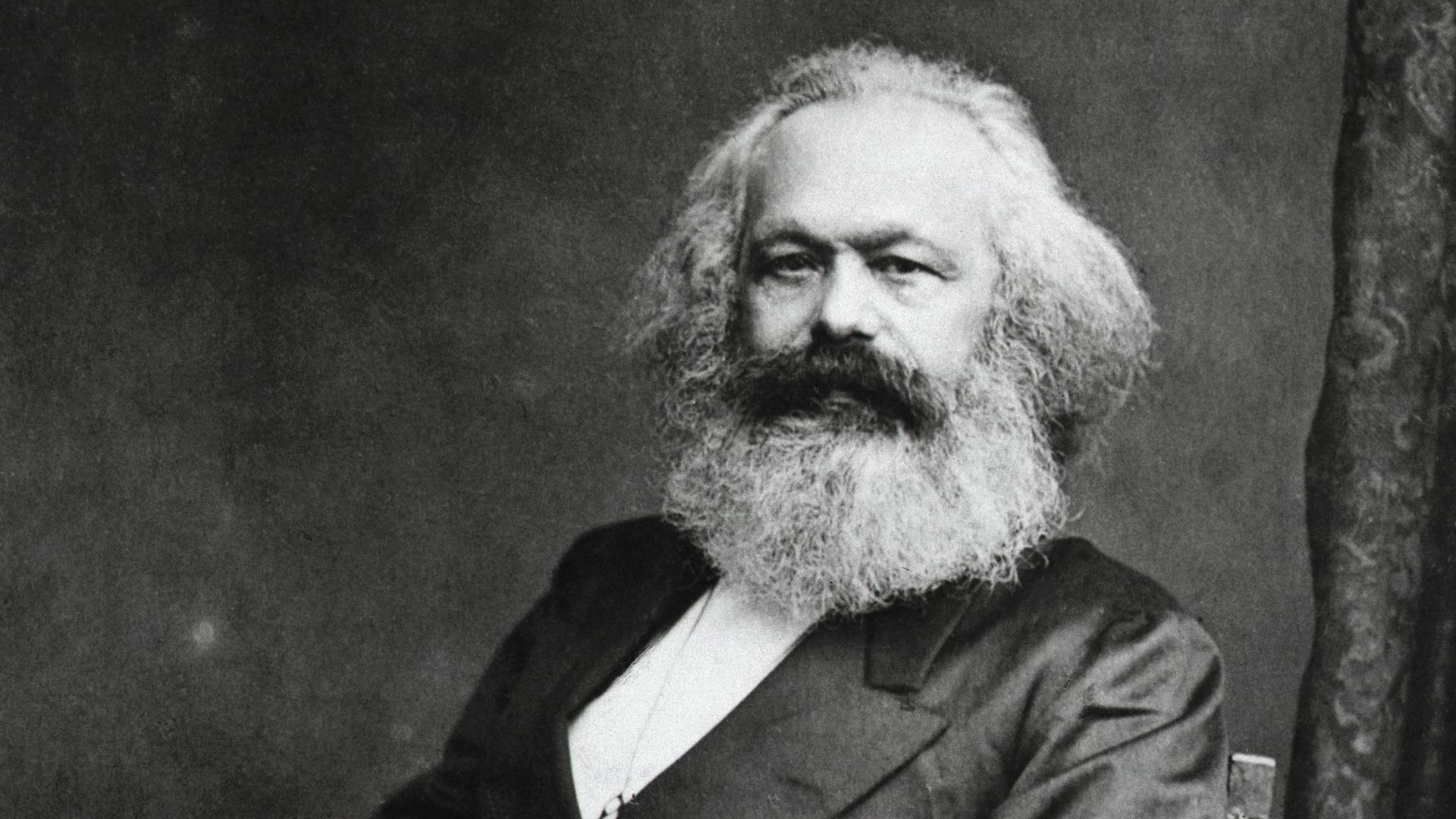 Photo of  German Political Philosopher Karl Marx sitting, 1818-1883.