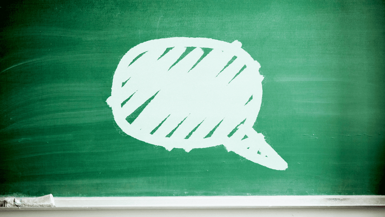 Illustration of a word balloon drawn in chalk on a chalkboard being erased.