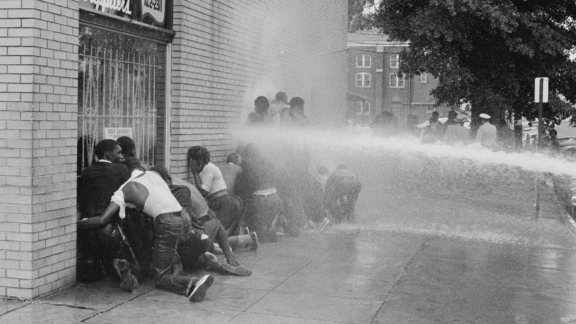 Firefighters spray protesters during the Birmingham Campaign in Alabama in May 1963
