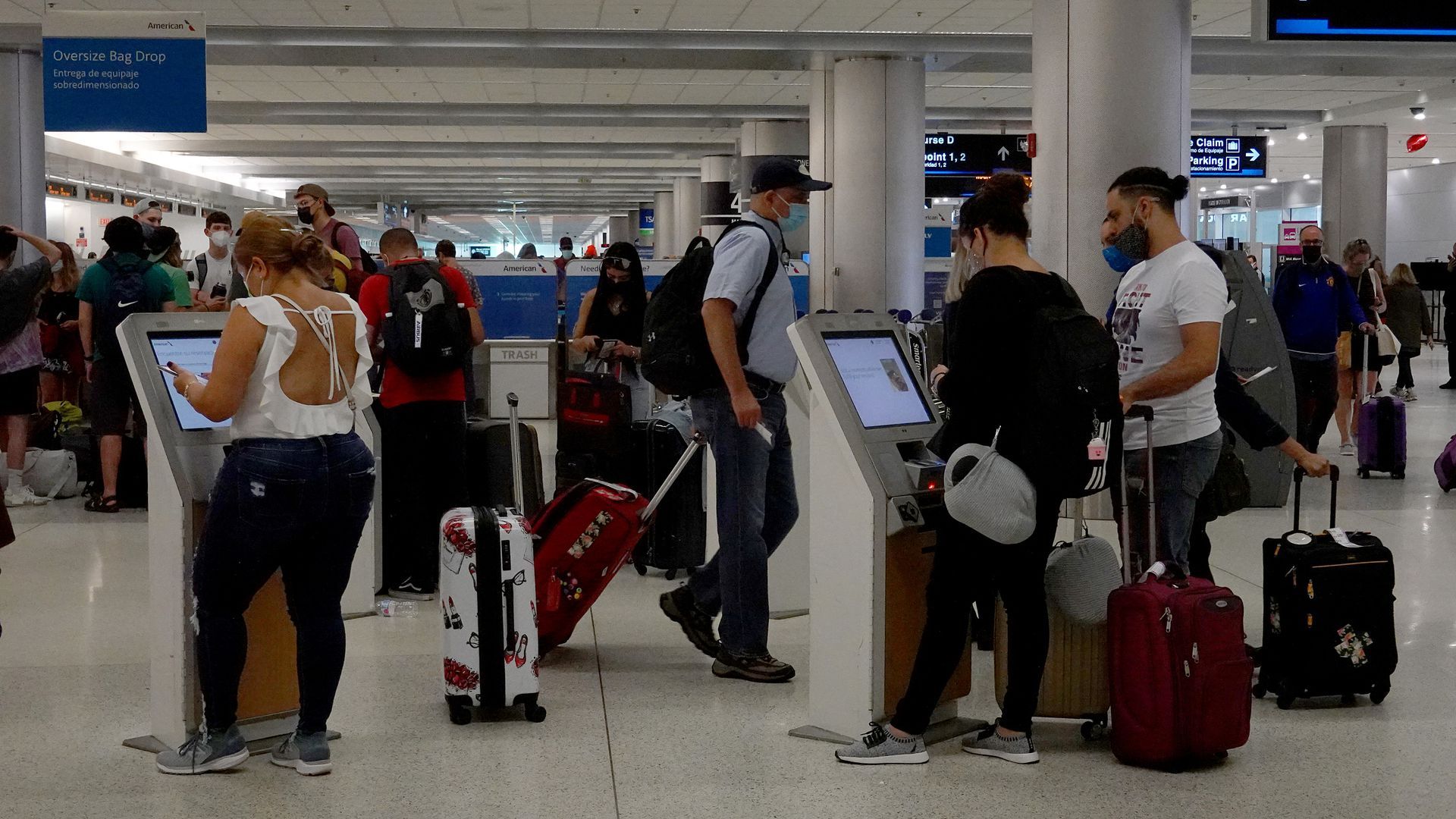 Travelers in the Miami International Airport. (Photo by Joe Raedle/Getty Images)