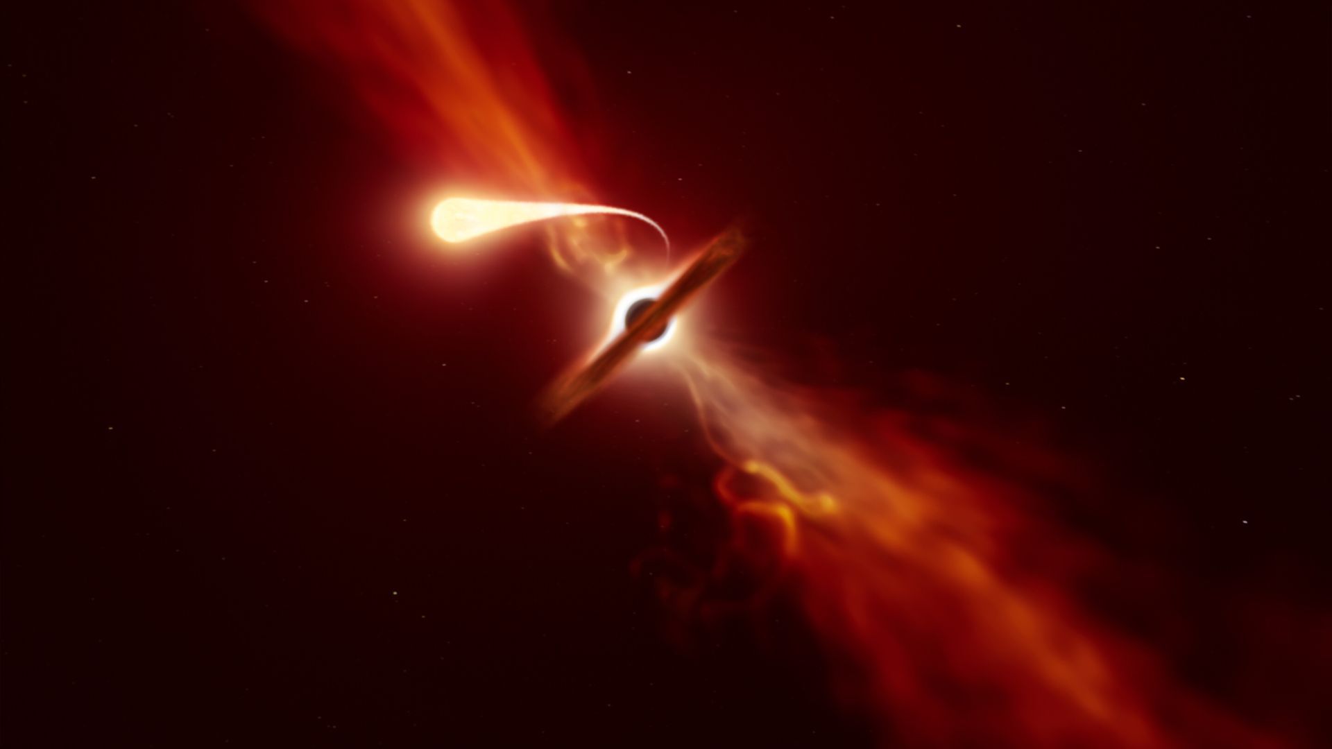 An illustration of a star being destroyed by a black hole. Image: ESO/M. Kornmesser