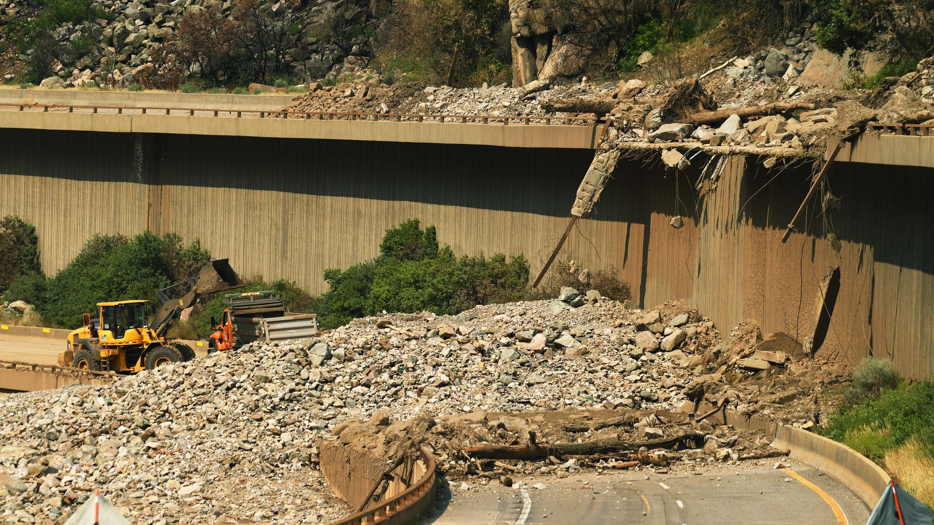 Crews work to reopen Interstate 70 through Glenwood Canyon after a mudslide in August. Photo: RJ Sangosti/The Denver Post via Getty Images