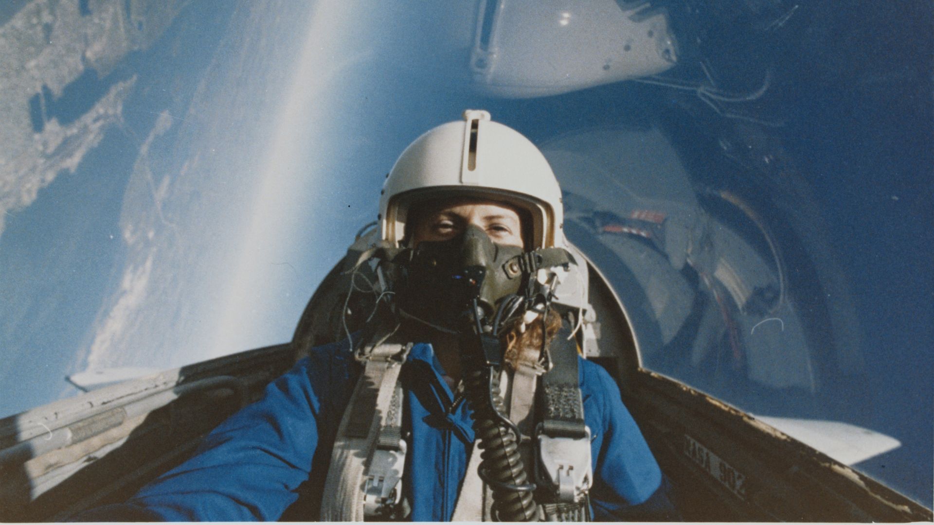 Christa McAuliffe in a cockpit far above Galveston Bay while training at Johnson Space Center in Houston to join the 1986 crew of the space shuttle Challenger.