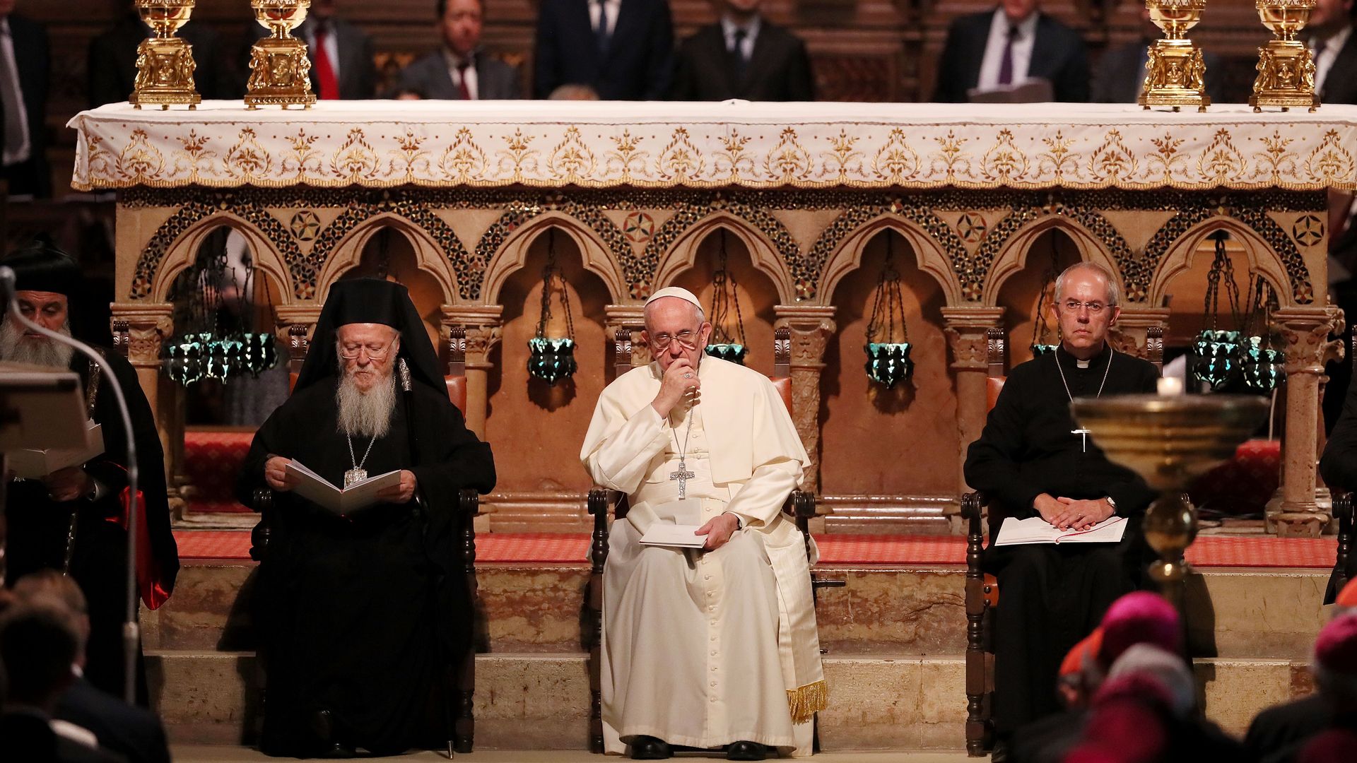 Ecumenical Patriarch Bartholomew, Pope Francis and Archbishop of Canterbury Justin Portal Welby seated in the Basilica of St. Francis in Assisi, Italy, in September 2016.