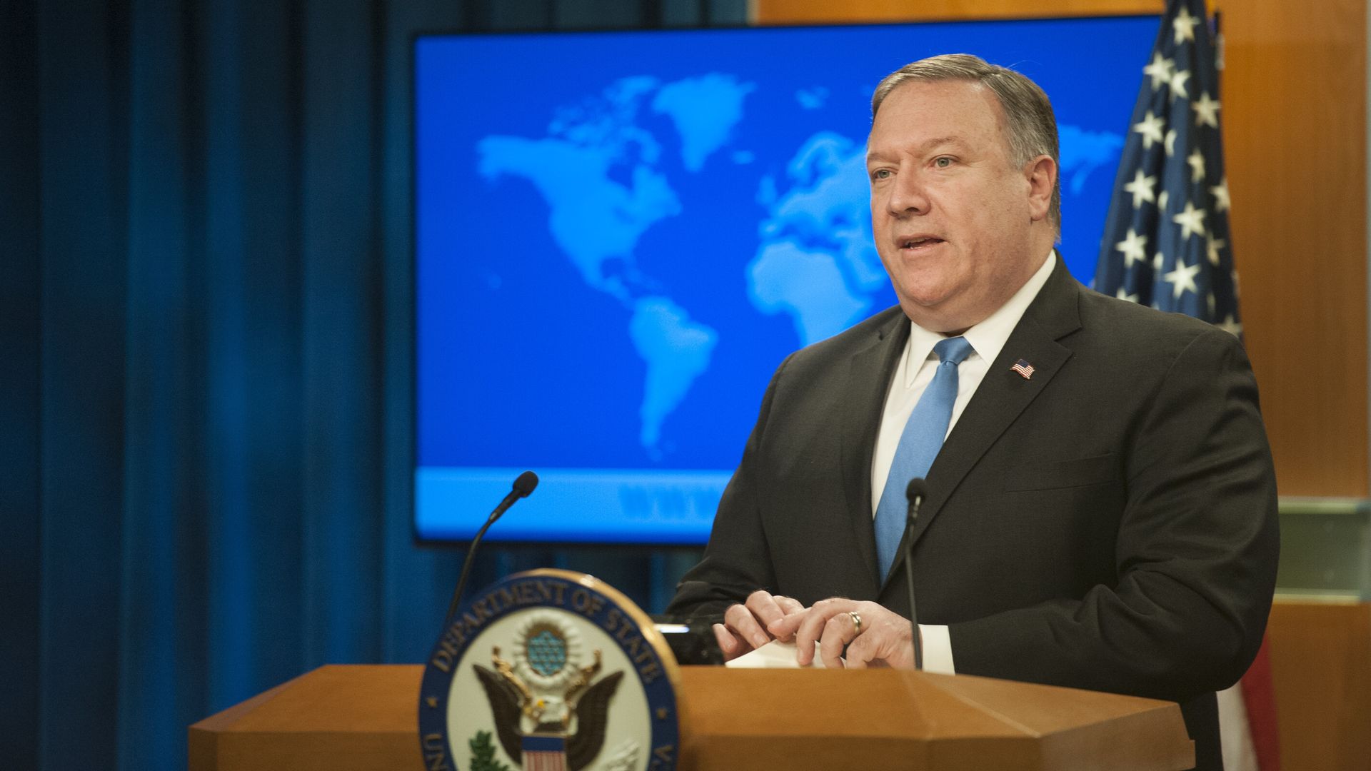 Secretary of State Mike Pompeo at a podium