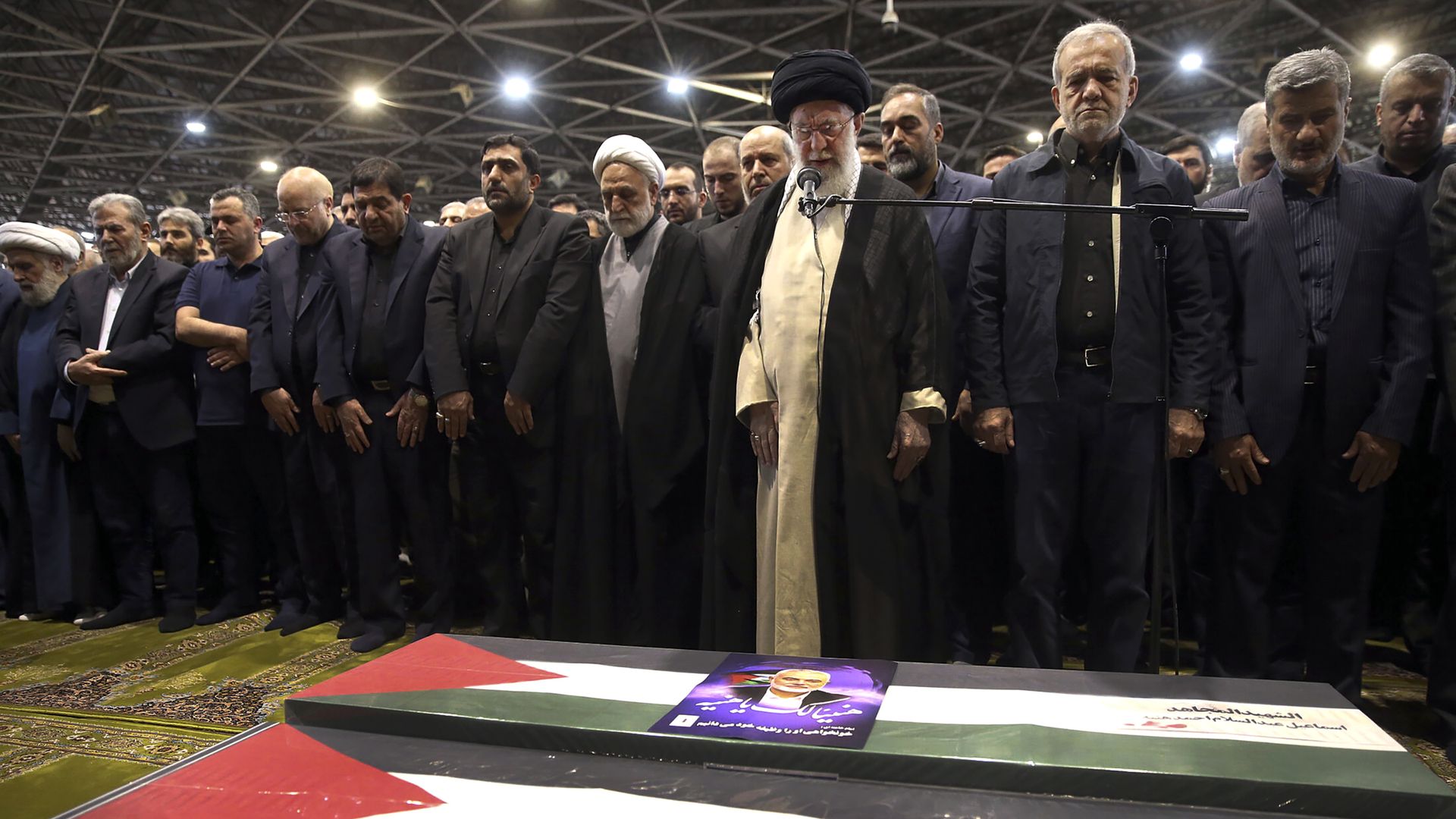 Khamenei and group pray