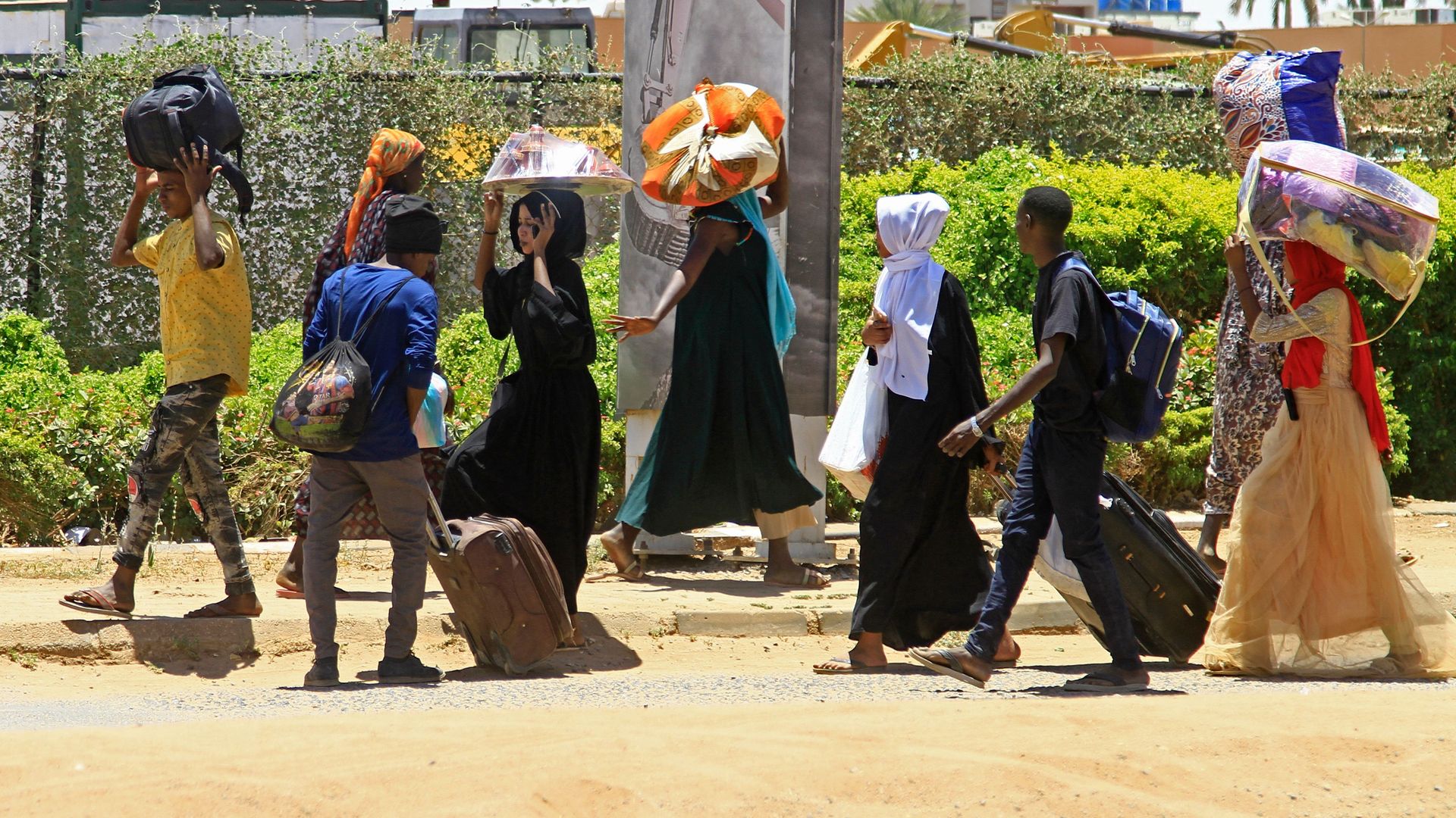 People flee from southern Khartoum on April 18. Photo: AFP via Getty Images
