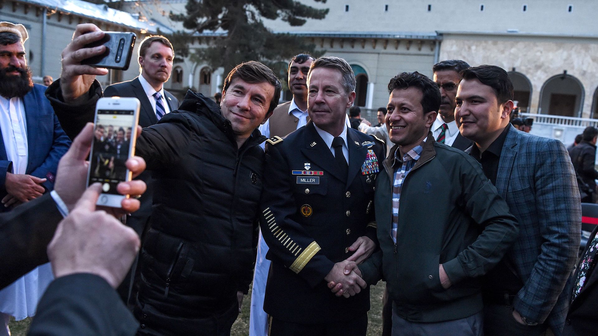 People taking photos with Gen. Austin Miller in Kabul in February 2020.