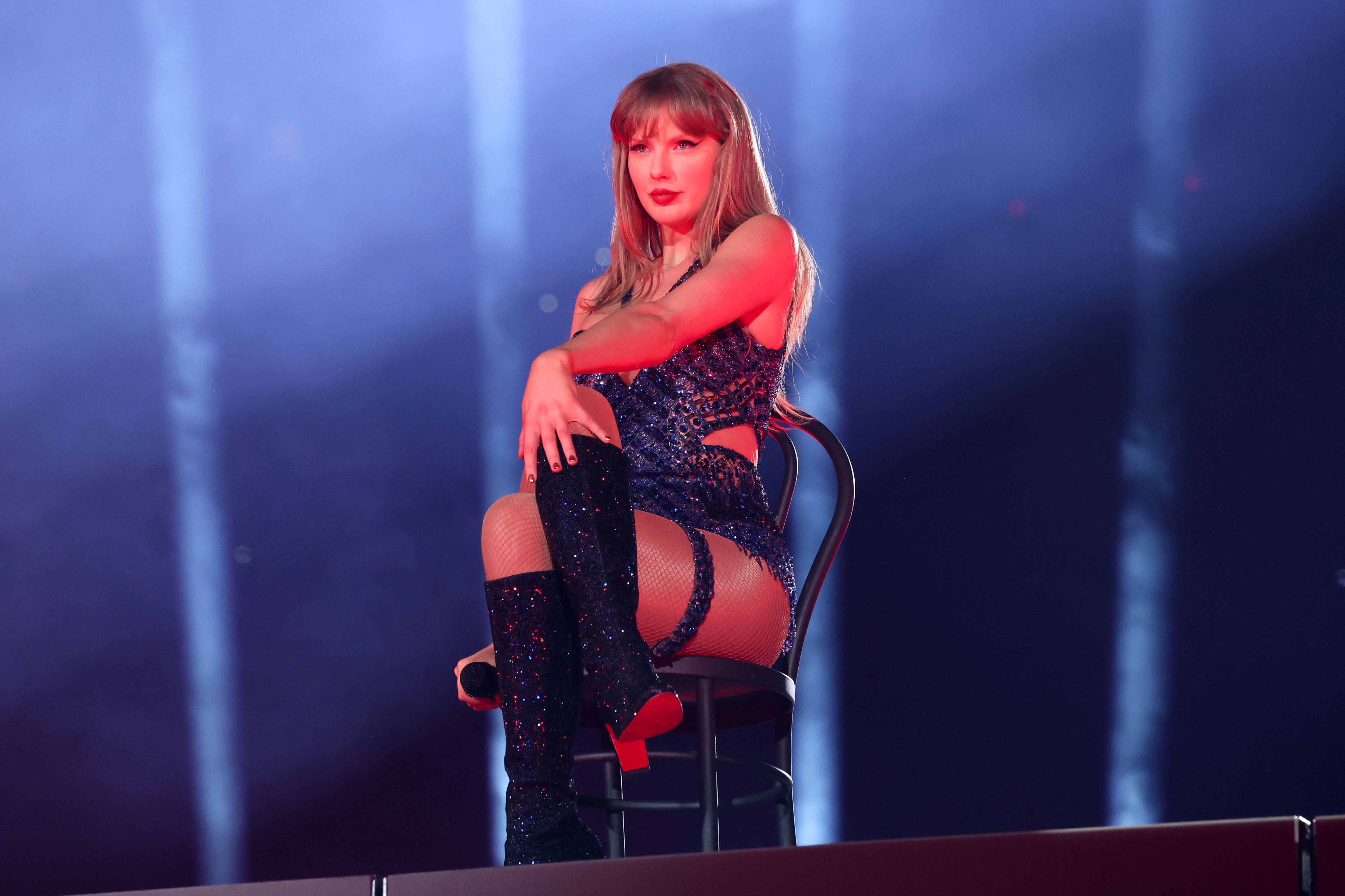 Taylor Swift performs onstage during "Taylor Swift | The Eras Tour" at Lucas Oil Stadium
