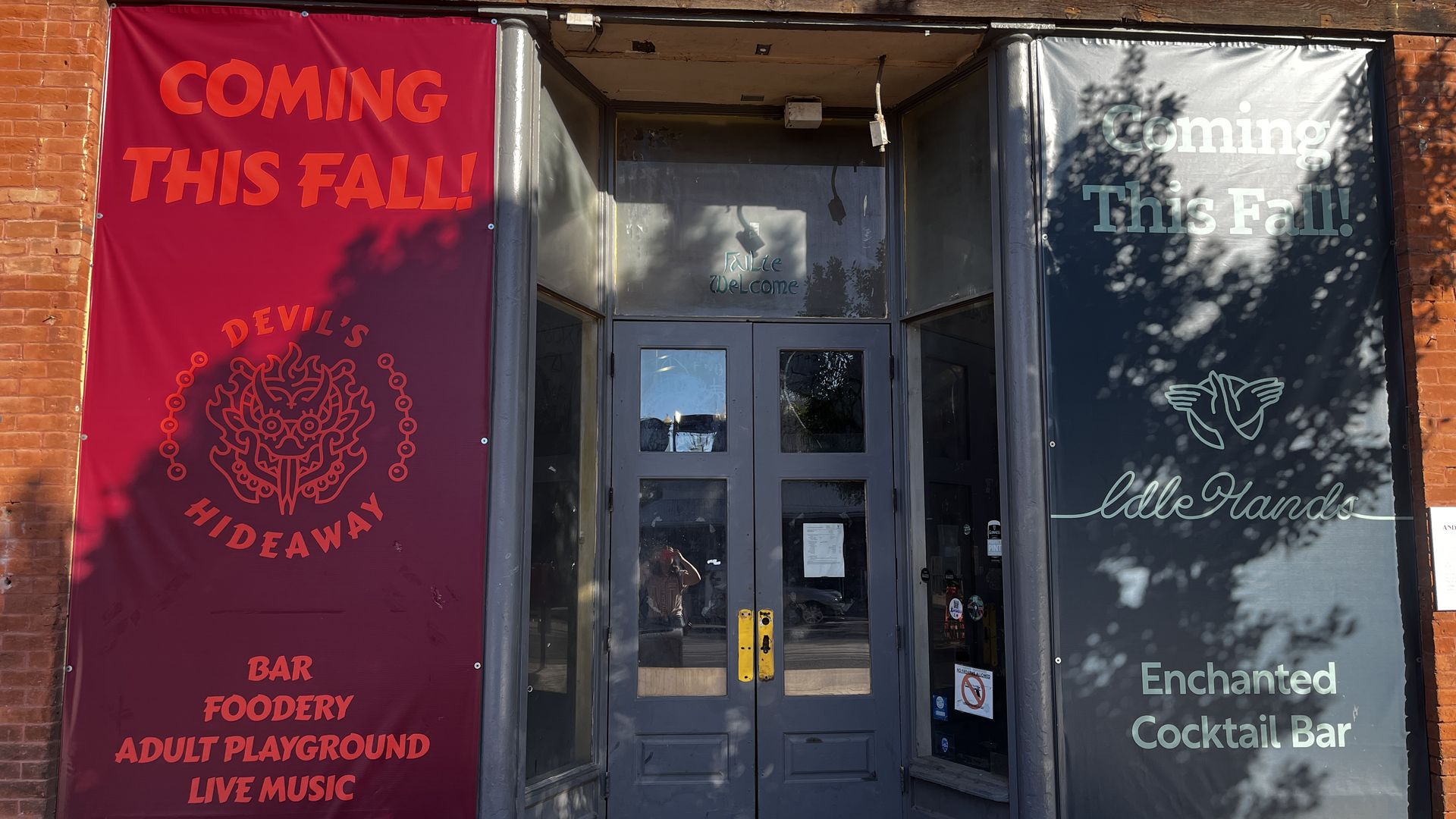 Signs that say "coming this fall."