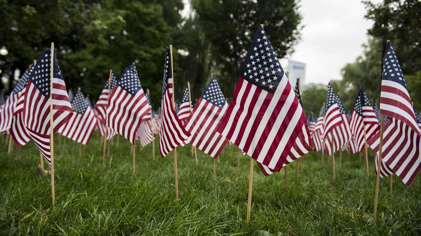 Runners carry US flags from Boston to NYC on 9/11 anniversary