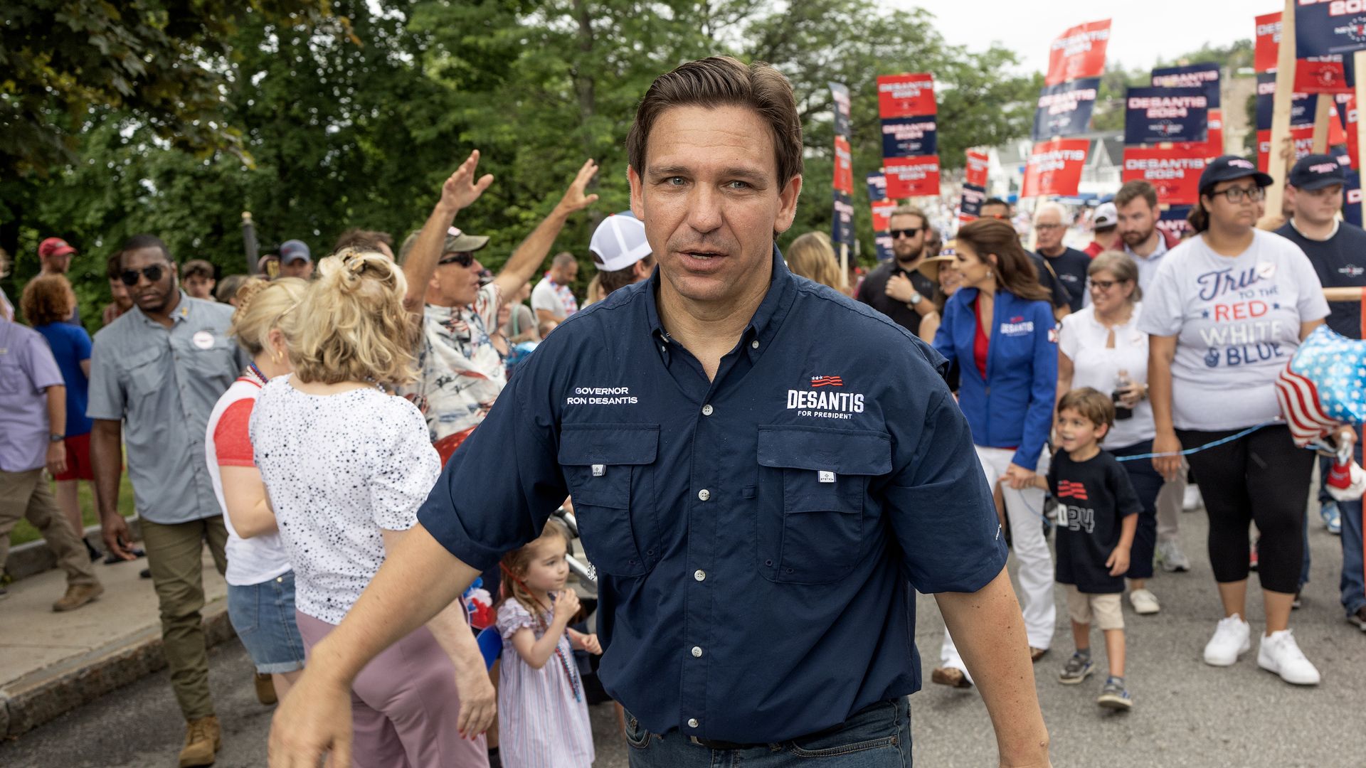 epublican presidential candidate, Florida Governor Ron DeSantis, joined by his wife Casey and their children, walks in a Fourth of July parade on July 4, 2023, in Wolfeboro, New Hampshire.