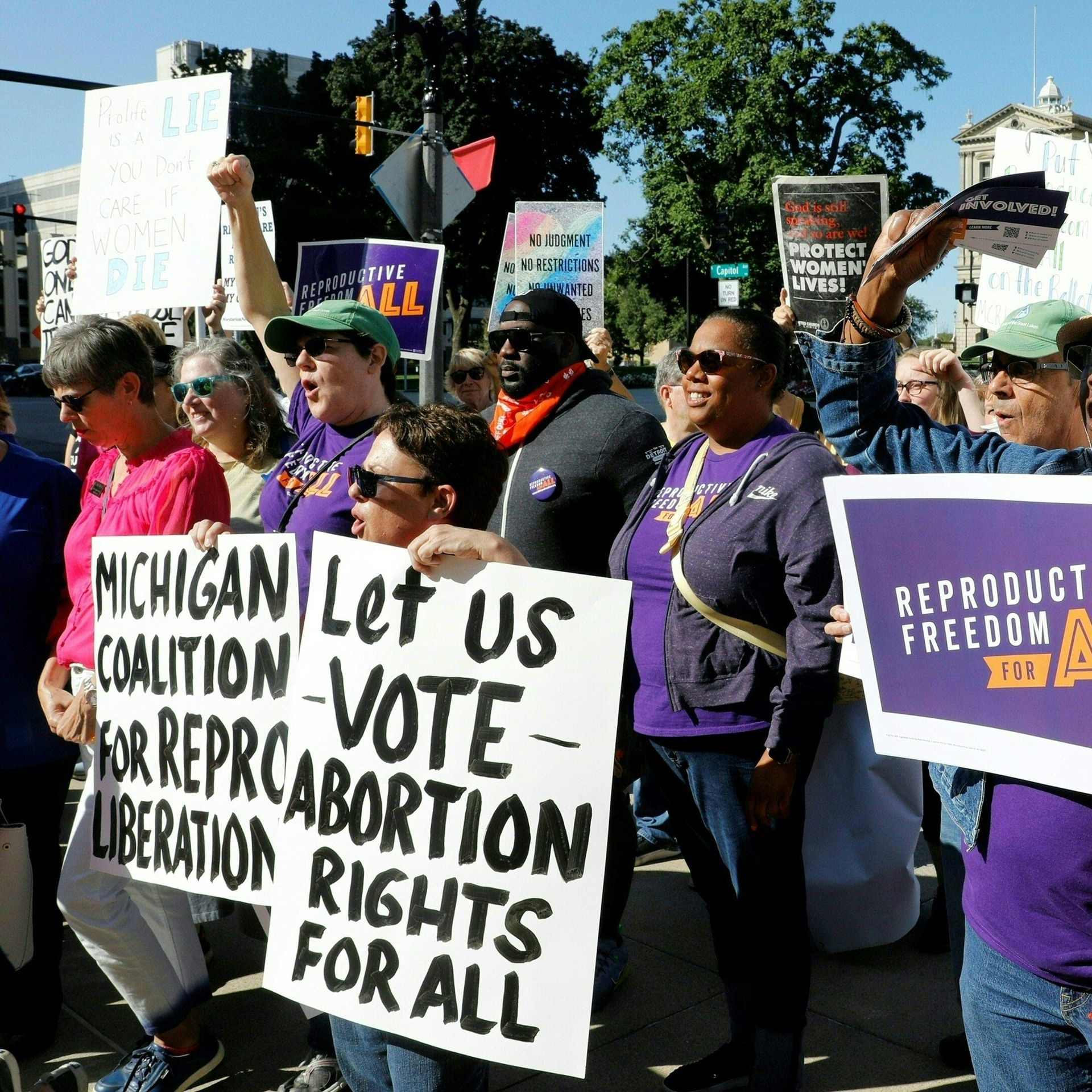 gather outside the Michigan State Capitol during a "Restore Roe" rally in Lansing, on September 7, 2022.
