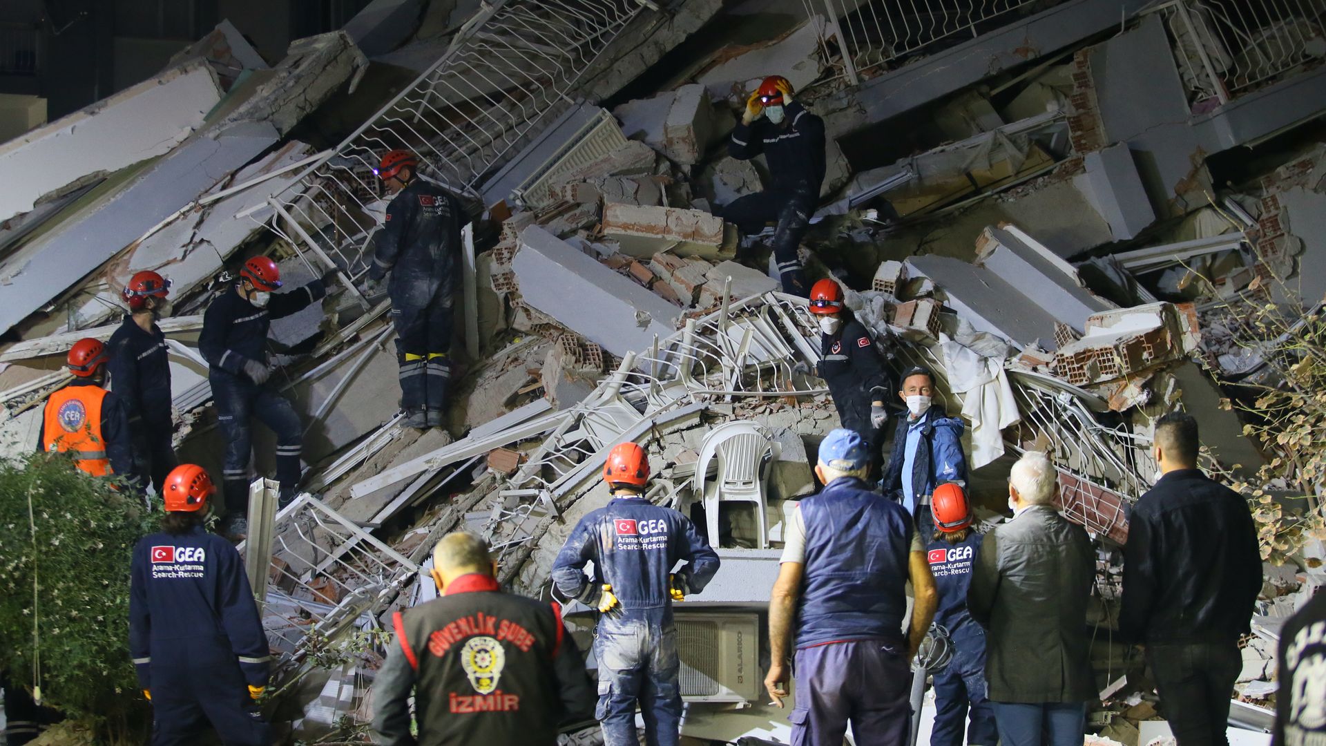 Search and rescue workers searching the debris of buildings in Izmir, Turkey, on Oct. 30.