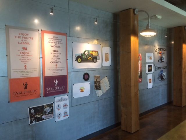 wall of creative at eric mower charlotte