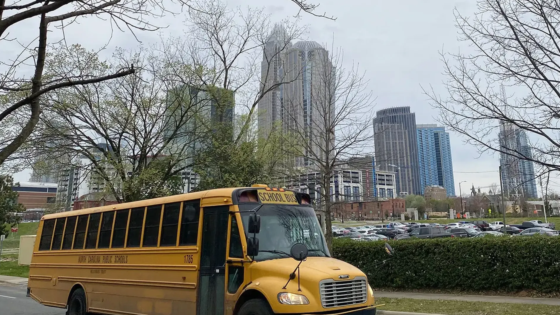 school bus in front of skyline