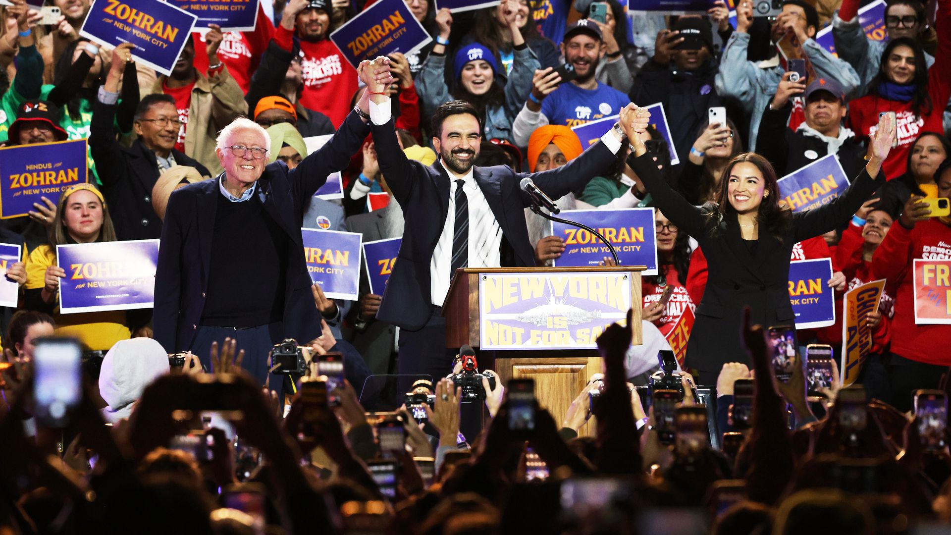 Sen. Bernie Sanders, I-Vt., left, New York City mayoral candidate Zohran Mamdani, center, and Rep. Alexandria Ocasio-Cortez, D-N.Y., appear on stage during a rally, Sunday, Oct. 26, 2025, in New York. (AP Photo/Heather Khalifa)