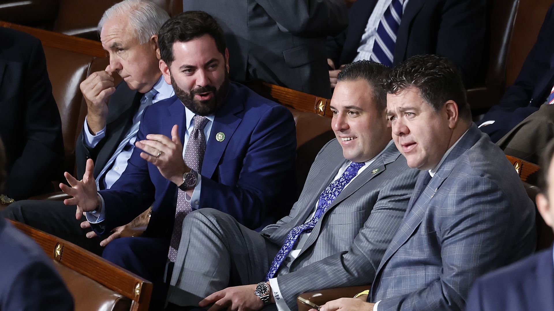 Reps. Mike Lawler, Anthony D'Esposito and Nick LaLota sitting in the House chamber.