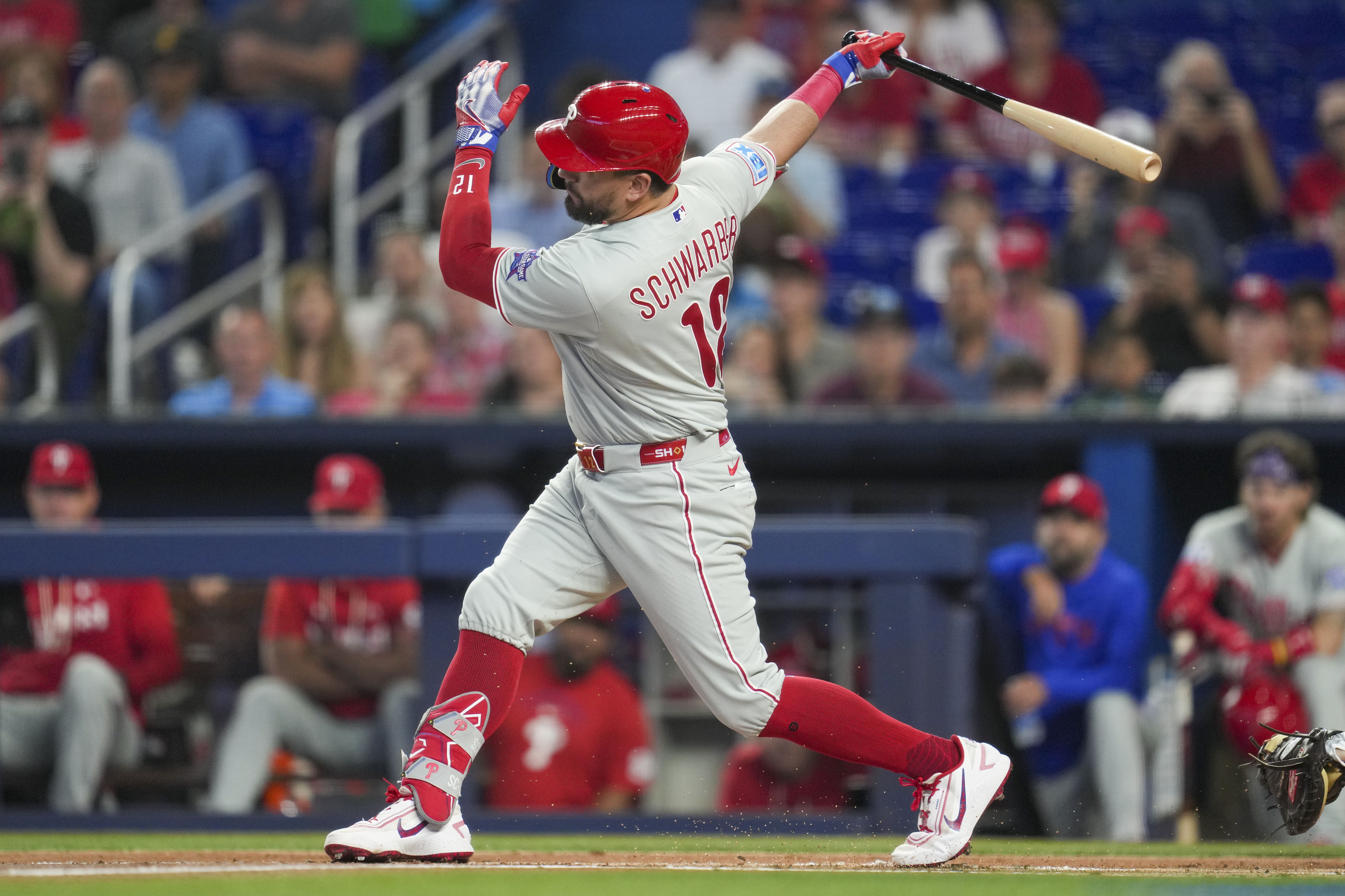 The Phillies' Kyle Schwarber strikes out during the first inning against the Miami Marlins.