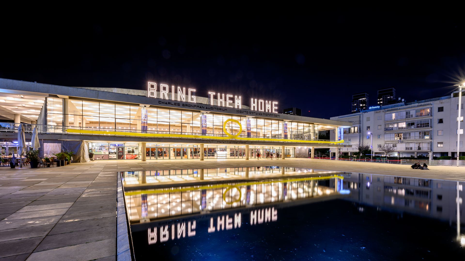 Heichal HaTarbut, home of the Israel Philharmonic, has a sign reading "Bring Them Home" on February 21, 2024 in Tel Aviv.